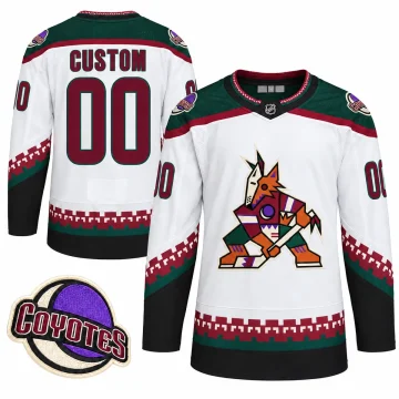 White Arizona Coyotes away Kachina jersey with CUSTOM and 00, front and back, and enlarged crescent Coyotes shoulder patch on white.