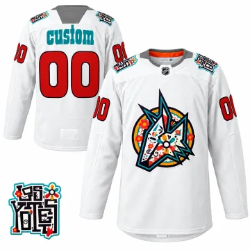 White Arizona Coyotes Los Yotes jersey with teal custom name, red 00, floral coyote crest and Los Yotes shoulder patch, front and back on white.