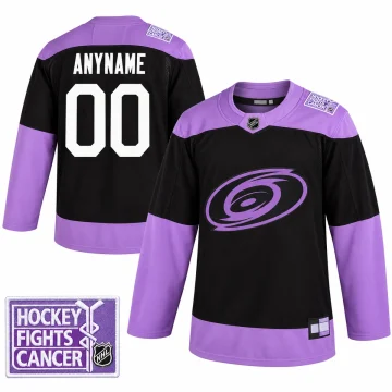 Carolina Hurricanes black and purple Hockey Fights Cancer jersey, front and back