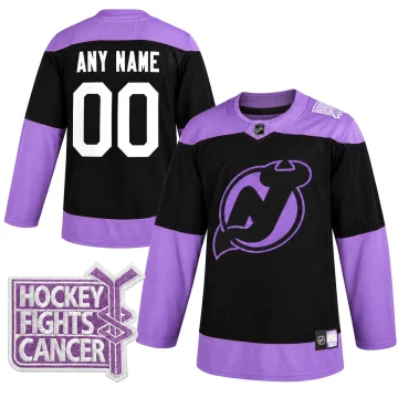 Front and back of a black and purple New Jersey Devils Hockey Fights Cancer custom jersey with patch.