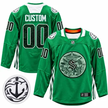 Seattle Kraken 2022 Green Night green warmup jersey shown front and back with One Roof Foundation patch on a pure white background