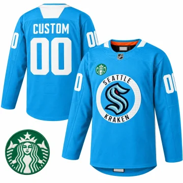 Seattle Kraken blue practice warmup jersey shown front and back with Starbucks patch on a pure white background