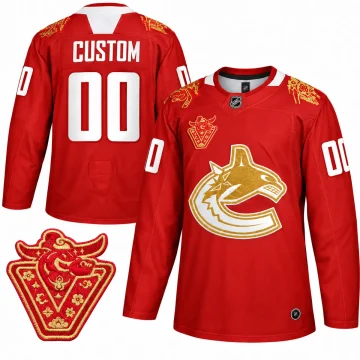 Front and back views of a custom red and gold Vancouver Canucks 2021 Lunar New Year Year of the Ox hockey jersey with CUSTOM and number 00