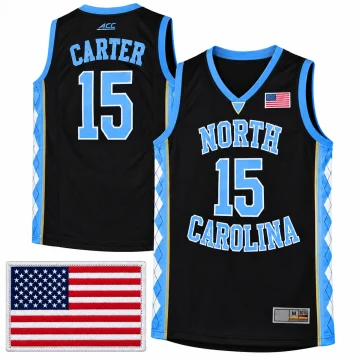 Vince Carter North Carolina Tar Heels number 15 black basketball jersey with Carolina blue and white lettering, blue argyle side panels, US flag chest patch and ACC upper back mark, front and back